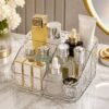 4-Compartment Acrylic Makeup & Skincare Organizer with beauty products on a vanity table