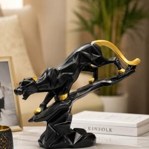 Modern black and gold angry leopard decorative sculpture made from fiber resin for luxury home and office decor.
