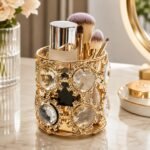 Luxury Crystal Golden Brush Holder for organizing makeup brushes on a vanity table.