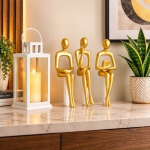 Gold Abstract Thinker Figurines Set of 3 modern home decor statues on decorative shelf